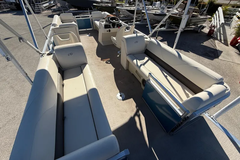 Slide: The Image of 2020 Avalon 2280 Venture Quad Lounger pontoon boat with spacious seating and modern design. - 13