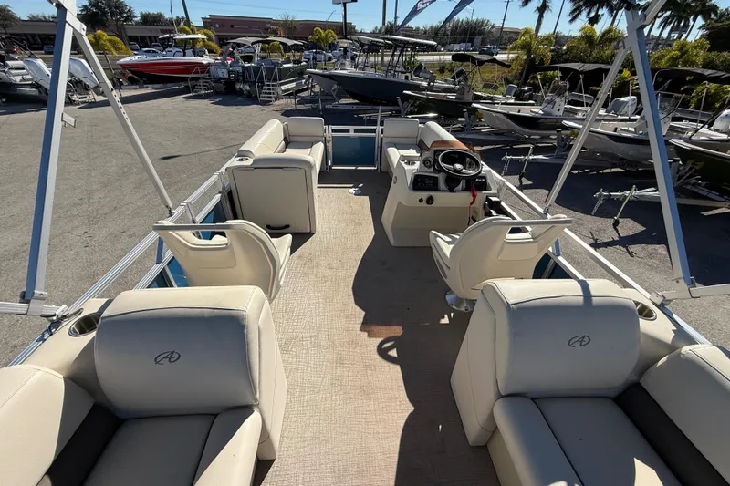 Slide: The Image of 2020 Avalon 2280 Venture Quad Lounger pontoon boat with spacious seating and modern helm. - 15