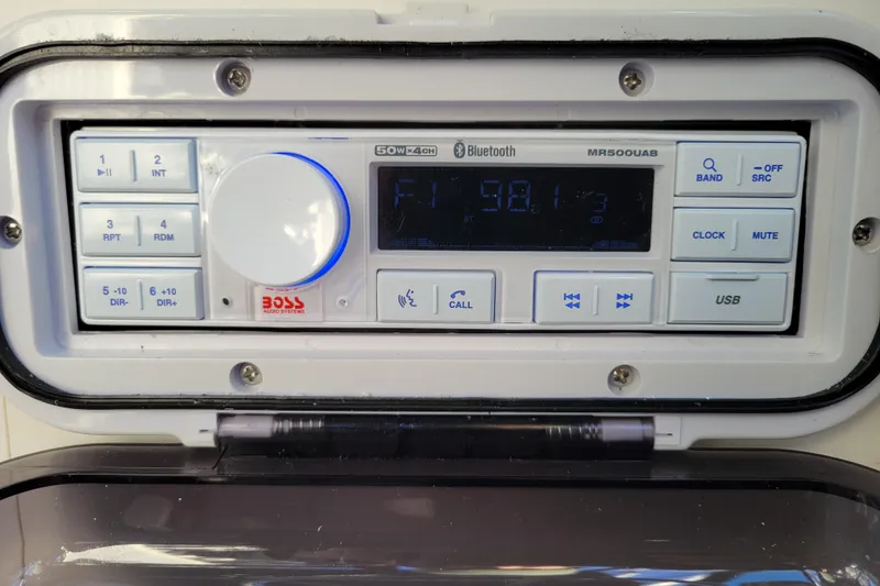 Slide: The Image of Boat stereo system with Bluetooth and USB in a 1998 Arima Sea Ranger 19. - 15