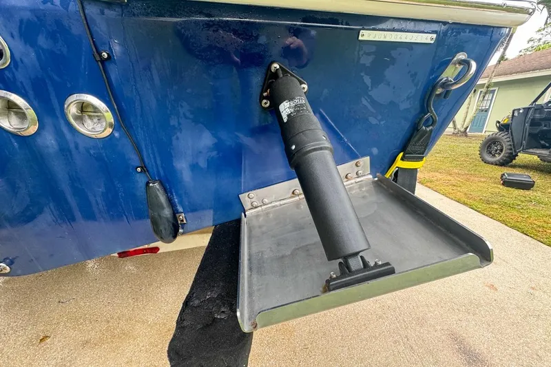 Slide: The Image of 2014 Everglades 230 Dual Console boat transom with trim tab and hydraulic actuator. - 20