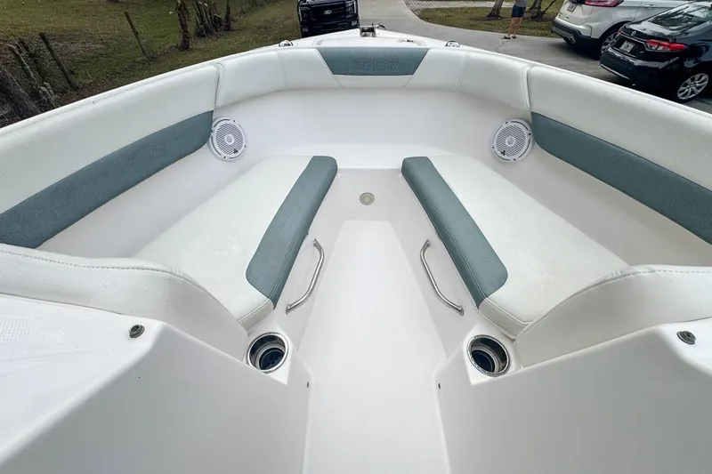Slide: The Image of Interior view of 2014 Everglades 230 Dual Console boat with cushioned seating. - 49
