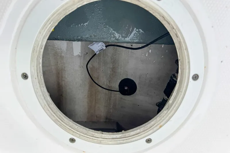 Slide: The Image of Inspection hatch of 2014 Everglades 230 Dual Console boat, showing interior components. - 85