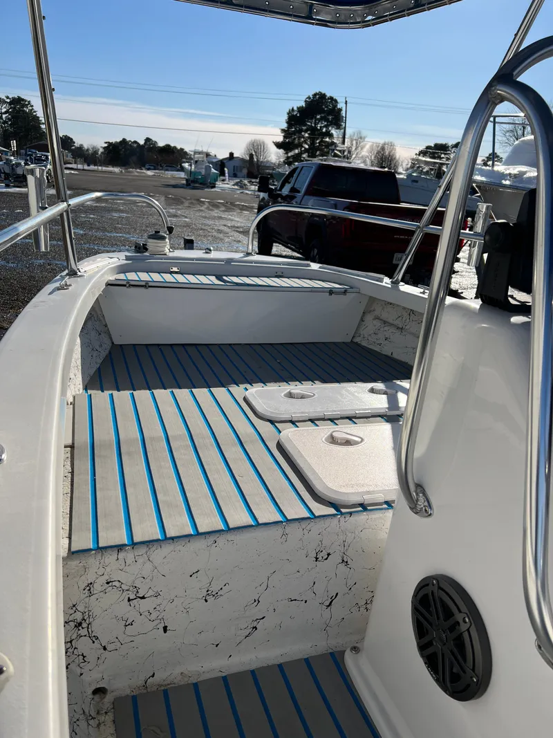 Slide: The Image of Interior view of a 2021 C-Hawk 16 Tiller boat outdoors. - 11