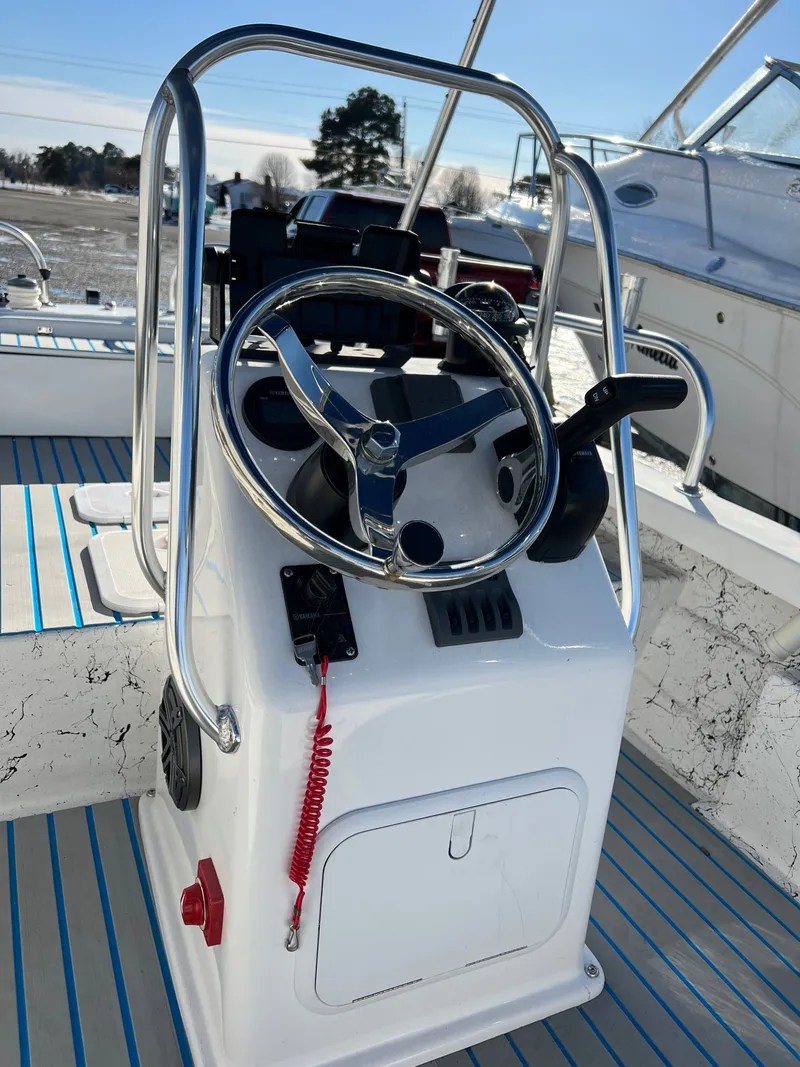 Slide: The Image of Steering console of a 2021 C-Hawk 16 Tiller boat. - 15