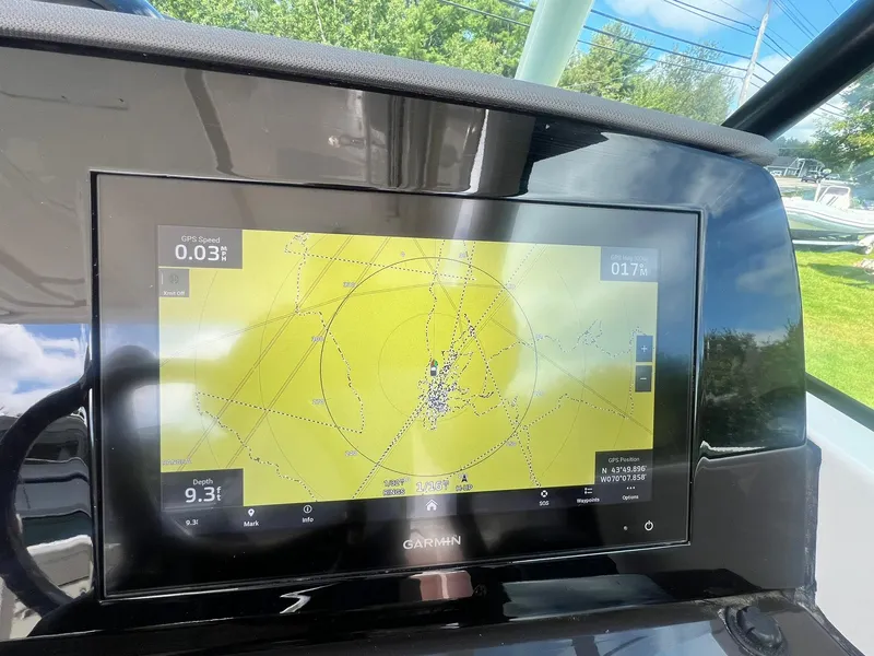 Slide: The Image of Garmin navigation display on 2022 Pursuit DC 266 Dual Console boat. - 26