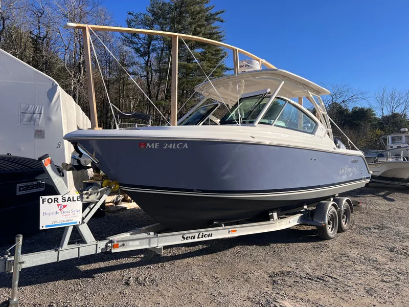 Slide: The Image of 2022 Pursuit DC 266 Dual Console boat for sale on trailer. - 28