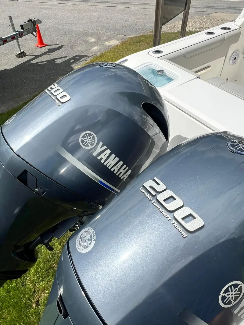 Slide: The Image of 2022 Pursuit DC 266 Dual Console with twin Yamaha 200 engines. - 34