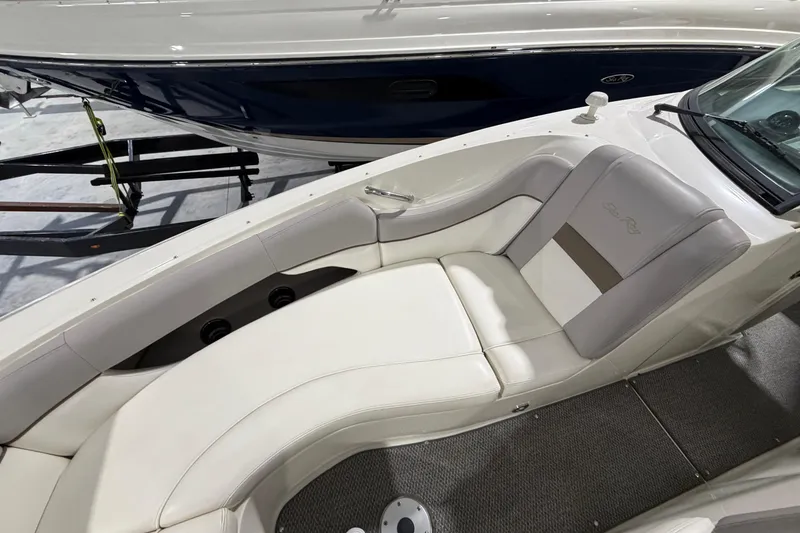 Slide: The Image of 2012 Sea Ray 300 SLX boat interior with white and gray seating, showcasing luxury design. - 20
