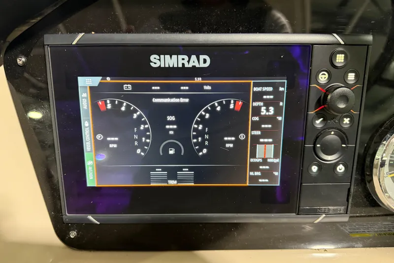 Slide: The Image of Simrad display on 2012 Sea Ray 300 SLX showing boat speed, depth, and RPM gauges. - 27