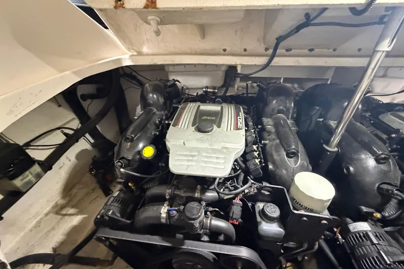 Slide: The Image of Engine compartment of a 2012 Sea Ray 300 SLX boat, featuring a MerCruiser 350 MAG engine. - 41
