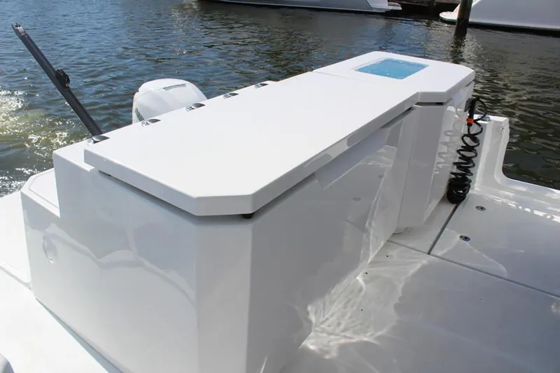 Slide: The Image of Manufacturer Provided Image: Aquila 36 Sport 2026 boat deck with sleek white design and water backdrop. - 11