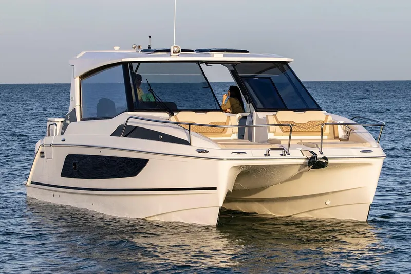Slide: The Image of Manufacturer Provided Image: 2026 Aquila 36 Sport catamaran cruising on open water. - 2