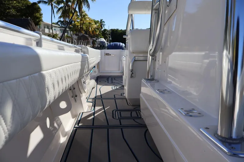 Slide: The Image of 2007 Contender 33 Tournament boat interior with storage compartments and speaker system. - 14