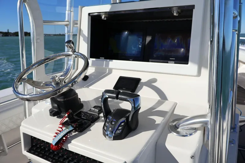 Slide: The Image of Control panel of a 2007 Contender 33 Tournament boat with Yamaha key lanyard. - 8