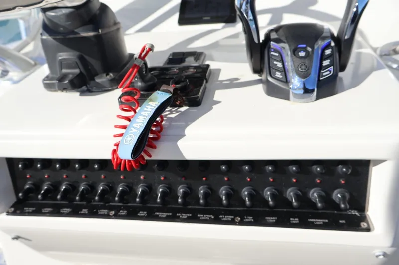 Slide: The Image of Storage compartments on a 2007 Contender 33 Tournament boat, featuring organized fishing gear. - 9