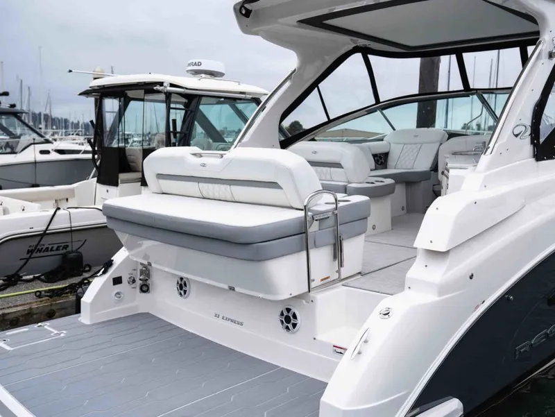 Slide: The Image of 2026 Regal 33 Express yacht with luxurious interior at the marina. - 12