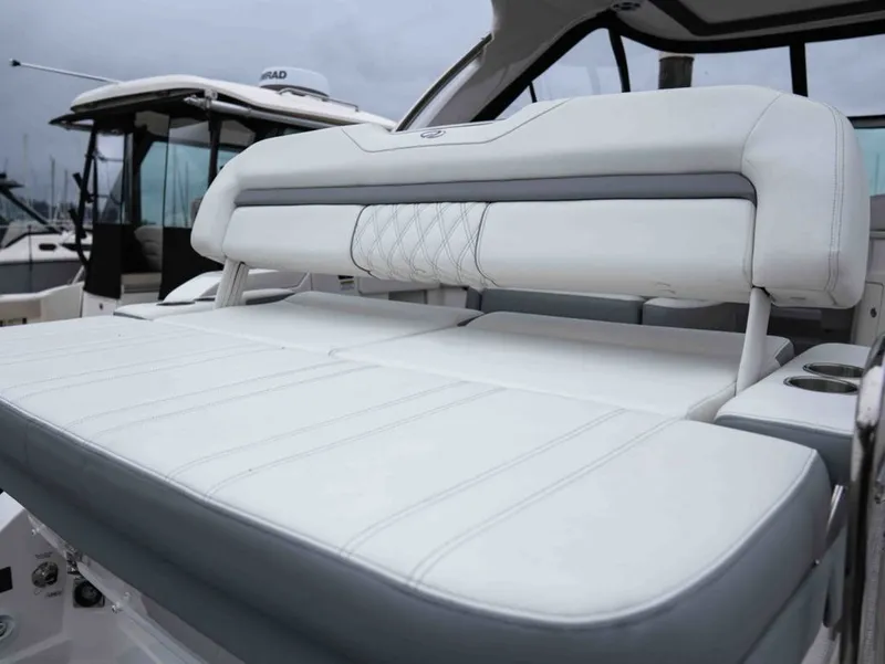 Slide: The Image of Luxurious seating on Regal 33 Express 2026 yacht. - 14