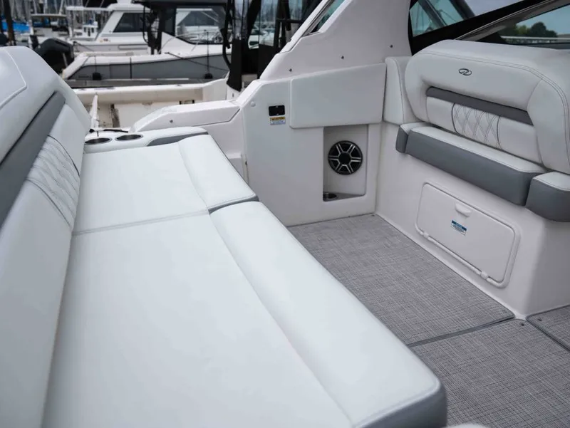 Slide: The Image of Interior of 2026 Regal 33 Express with white upholstery. - 16