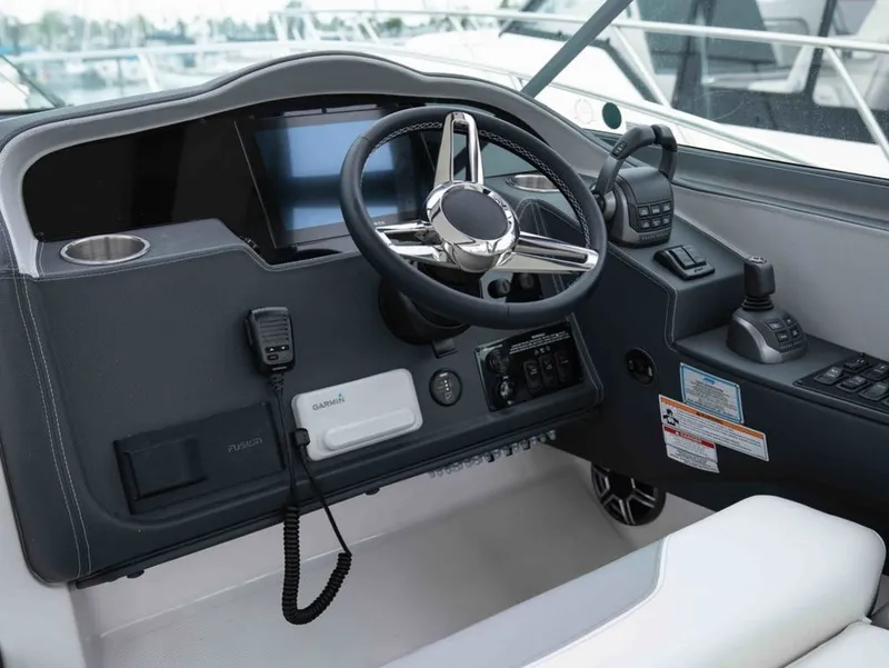 Slide: The Image of 2026 Regal 33 Express cockpit with modern controls. - 22