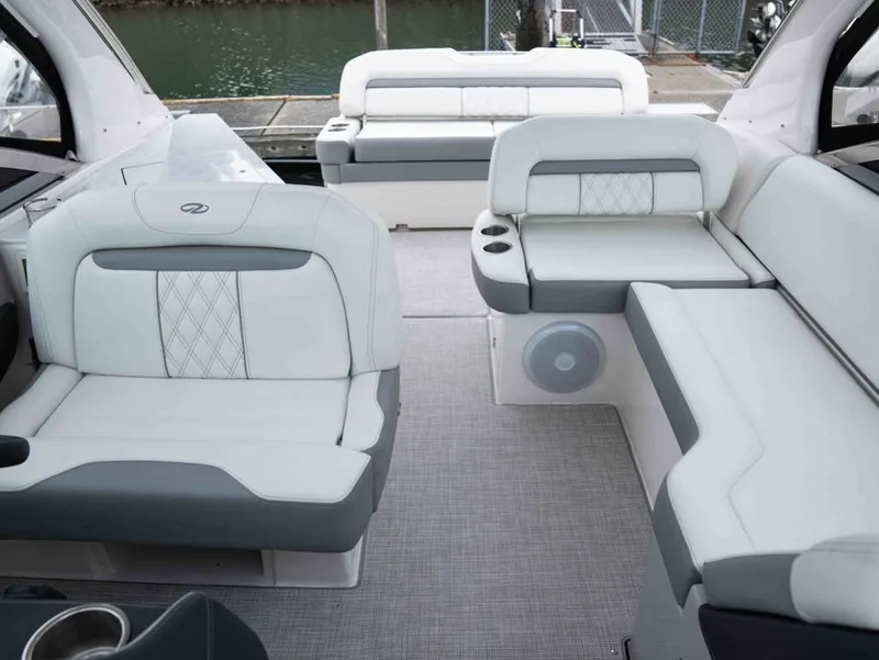 Slide: The Image of Interior of 2026 Regal 33 Express with luxurious seating. - 24