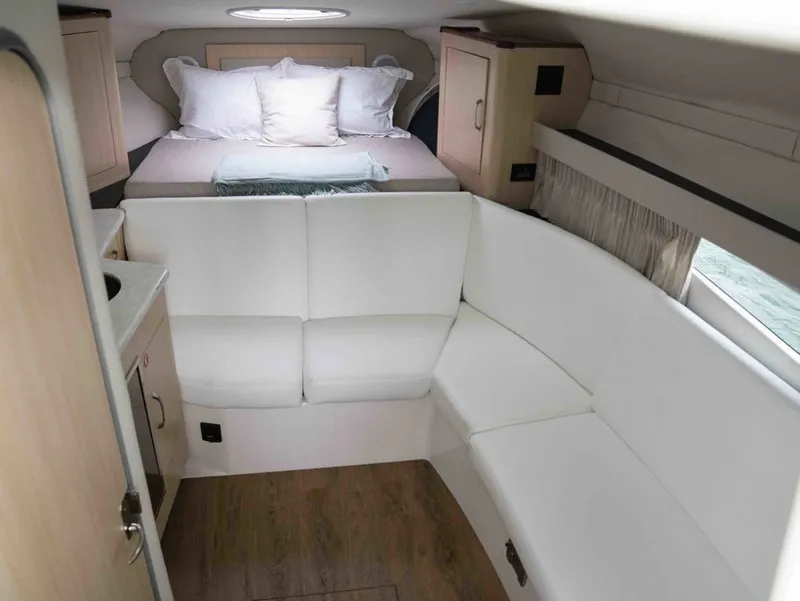 Slide: The Image of Interior of 2026 Regal 33 Express with bed and sofa. - 29