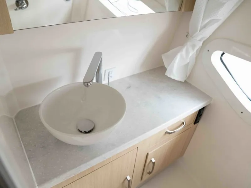 Slide: The Image of Modern bathroom in Regal 33 Express 2026 boat. - 37
