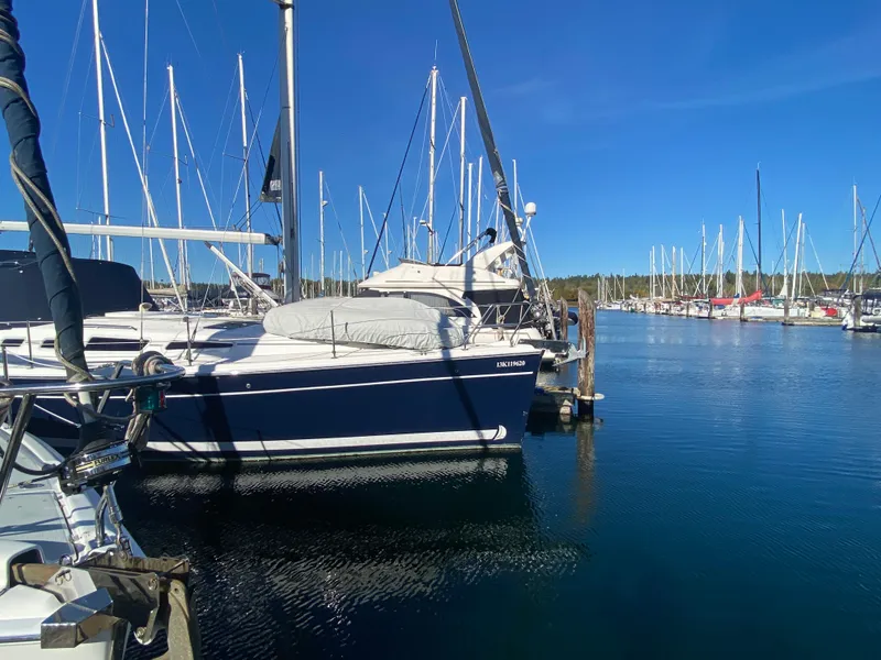 Slide: The Image of 2006 Hunter 38 sailboat docked in marina. - 1