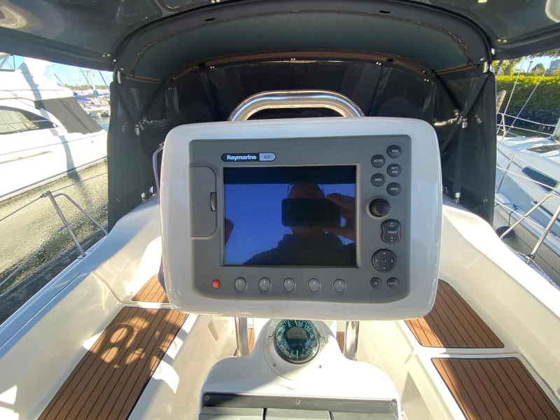 Slide: The Image of Control console of a 2006 Hunter 38 yacht. - 10