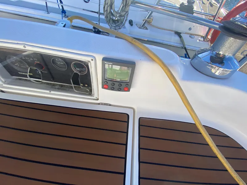 Slide: The Image of Cockpit of a 2006 Hunter 38 sailboat with instrument panel. - 11