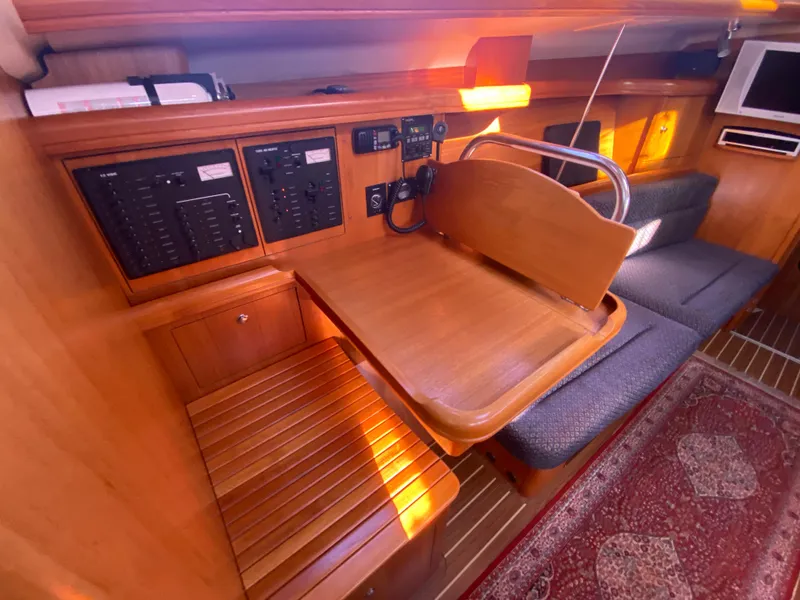 Slide: The Image of Interior of a 2006 Hunter 38 yacht with wooden furnishings. - 23