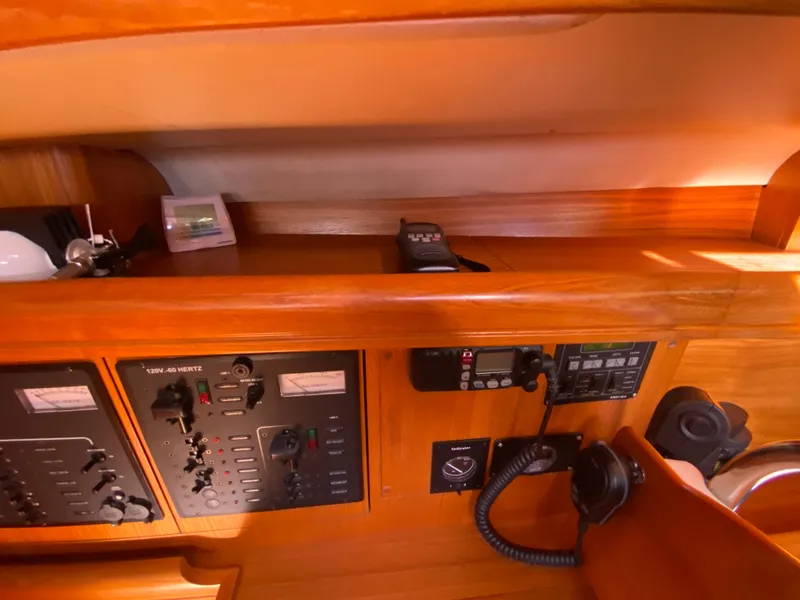 Slide: The Image of Interior view of a 2006 Hunter 38 sailboat with control panel. - 26