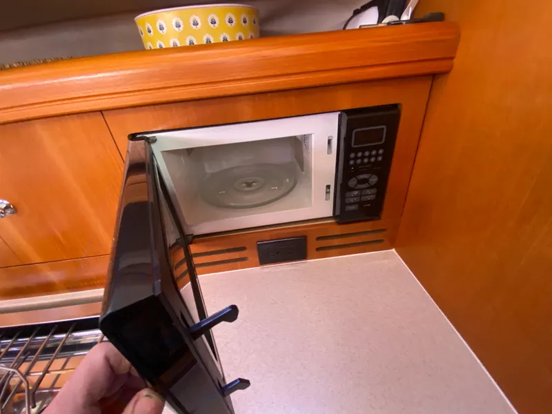 Slide: The Image of Microwave in the galley of a 2006 Hunter 38 yacht. - 42