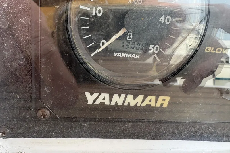 Slide: The Image of Close-up of a Yanmar engine gauge on a 2006 Hunter 38 sailboat. - 62
