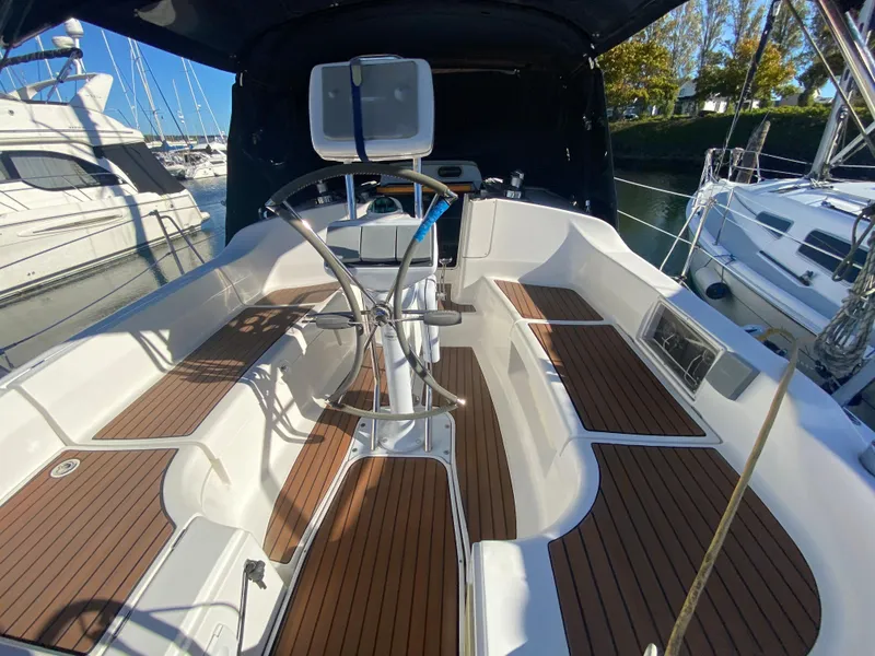 Slide: The Image of Cockpit of a 2006 Hunter 38 yacht with wooden decks. - 7