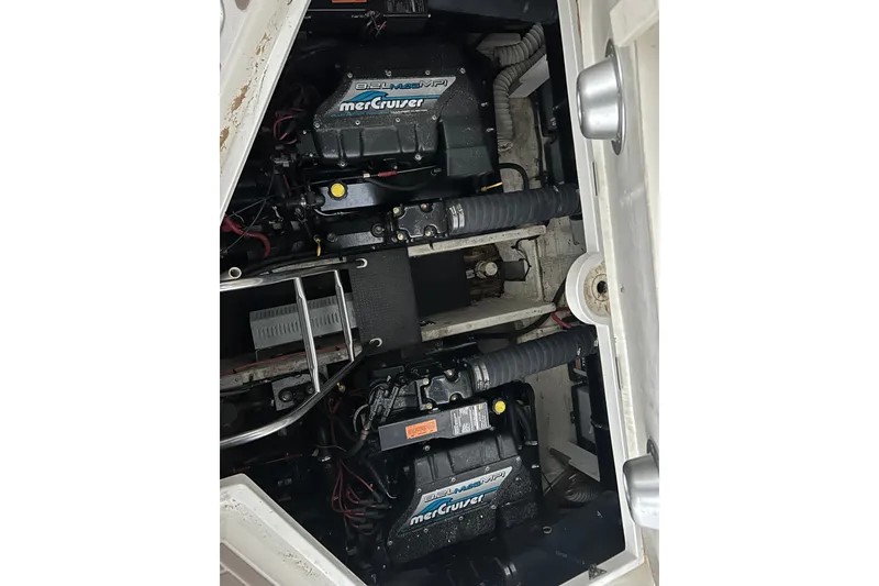 Slide: The Image of Engine compartment of 1998 Cruisers Yachts 4270 Express with MerCruiser engines. - 20