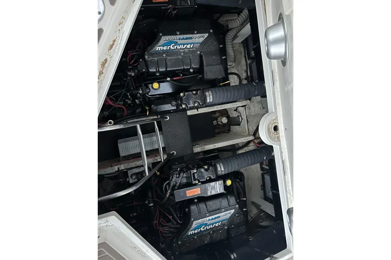 Slide: The Image of Engine compartment of 1998 Cruisers Yachts 4270 Express with MerCruiser engines. - 18
