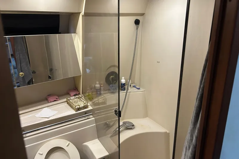 Slide: The Image of Bathroom interior of 1998 Cruisers Yachts 4270 Express with shower and toilet. - 7