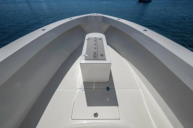 Slide: The Image of Bow view of 2017 Venture 39 Open boat on calm water. - 22