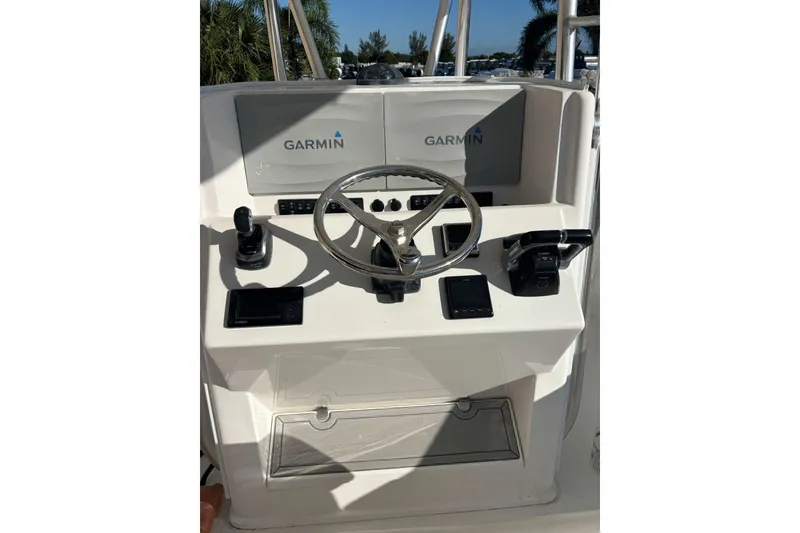 Slide: The Image of Steering console of 2017 Venture 39 Open boat with Garmin navigation system. - 4