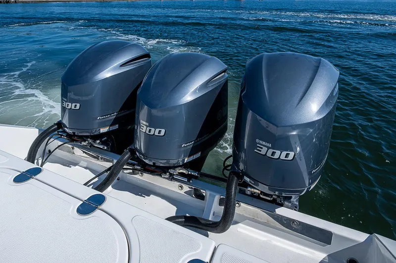 Slide: The Image of Triple Yamaha 300 outboard engines on a 2017 Venture 39 Open boat. - 40