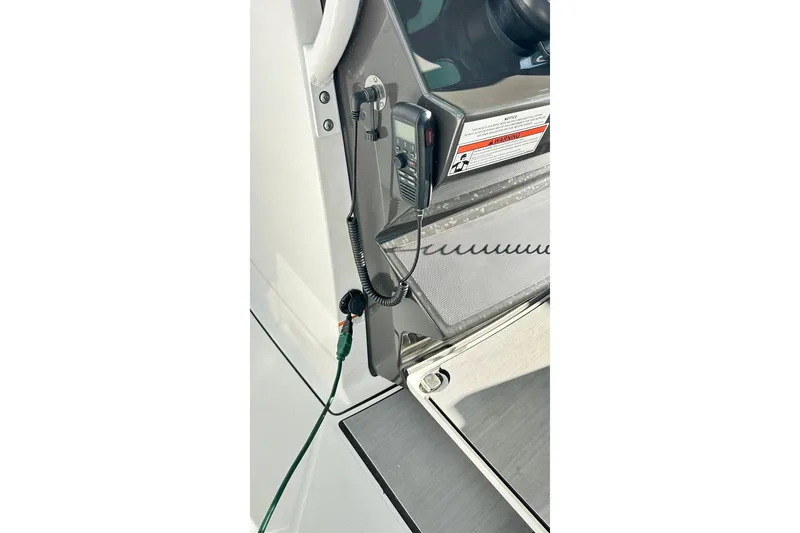 Slide: The Image of 2023 Blackfin 332 CC boat interior with communication equipment and wiring. - 15