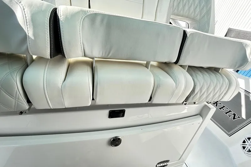 Slide: The Image of 2023 Blackfin 332 CC boat seating with white upholstery and diamond stitching. - 21