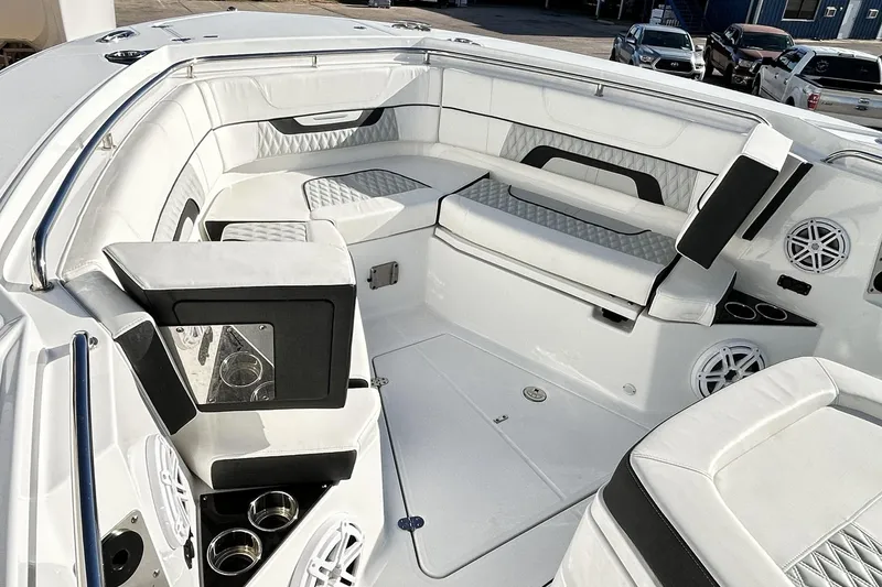 Slide: The Image of 2023 Blackfin 332 CC boat interior with luxurious seating and modern amenities. - 33