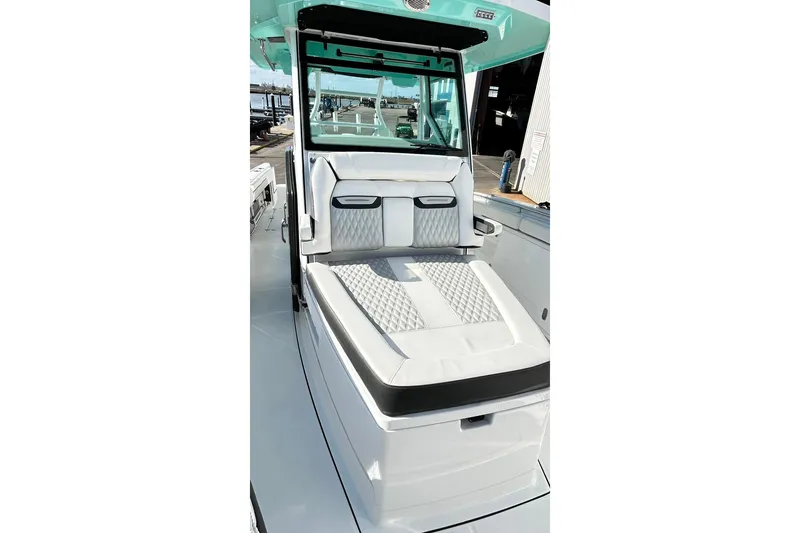 Slide: The Image of 2023 Blackfin 332 CC boat with luxurious seating and modern design. - 38