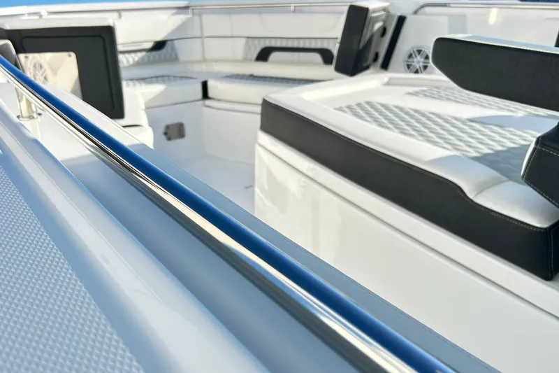 Slide: The Image of 2023 Blackfin 332 CC boat interior with sleek seating and modern design. - 41