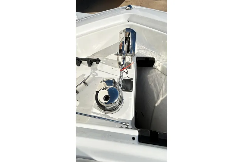 Slide: The Image of 2023 Blackfin 332 CC boat anchor system with polished metal components. - 43