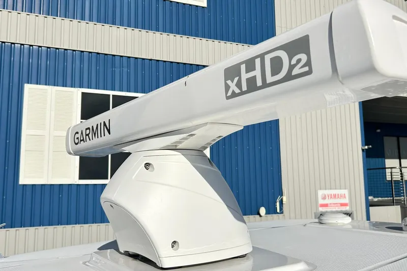 Slide: The Image of Garmin xHD2 radar on 2023 Blackfin 332 CC boat, blue building background. - 59