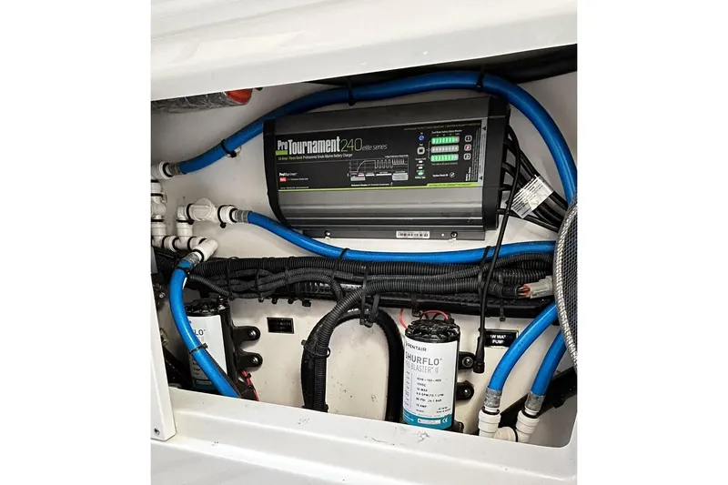 Slide: The Image of 2023 Blackfin 332 CC boat electrical system with ProTournament 240 battery charger. - 70