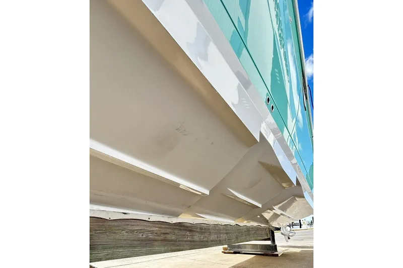 Slide: The Image of 2023 Blackfin 332 CC boat hull, showcasing sleek design and craftsmanship. - 75