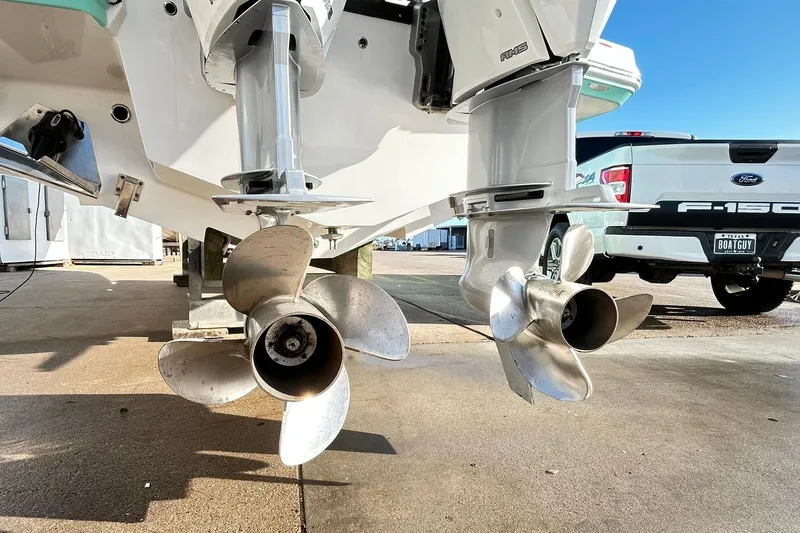 Slide: The Image of 2023 Blackfin 332 CC boat propellers and Ford F-150 truck in background. - 78